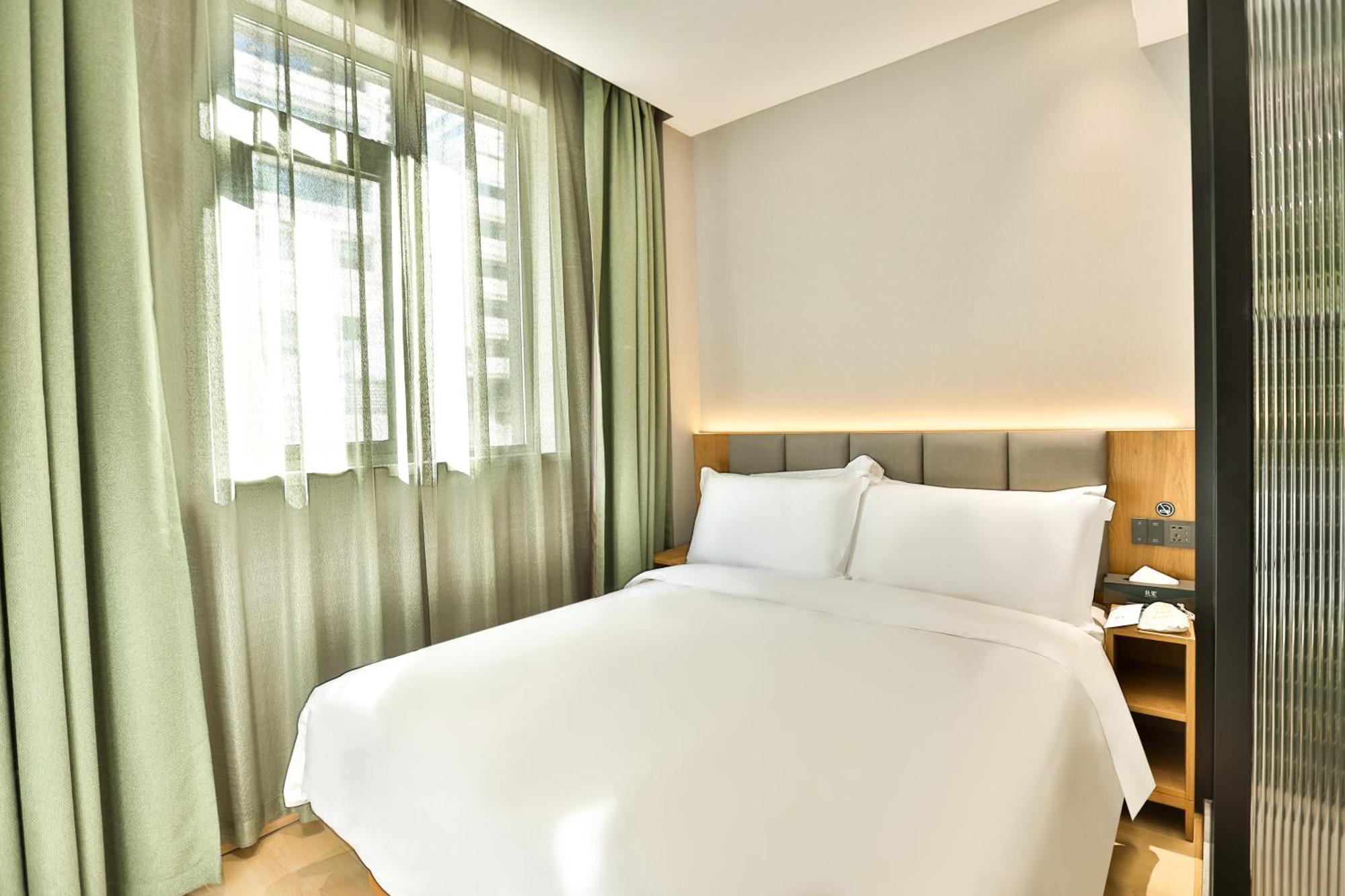 True Go Hotel - Shanghai Jing'An Temple Nanjing West Road 외부 사진